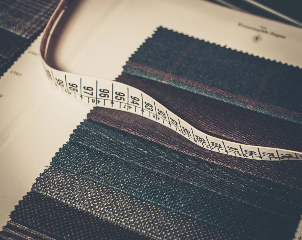 How-much-does-a-custom-suit-cost-showing-fabrics-and-pricing