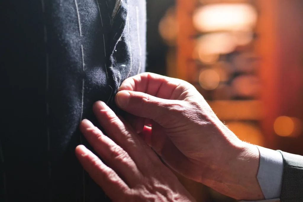 showing-example-of-craftmanship-for-tailored-suits-cost