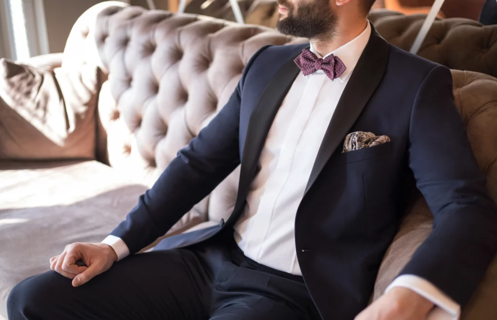 Semi-formal vs formal wedding attire - showing a midnight navy wedding tuxedo